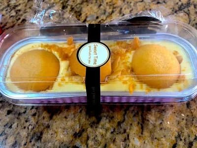 Packaged banana pudding cake from Halal Pita’s dessert selection