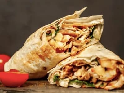 Chicken shawarma wrap cut in half